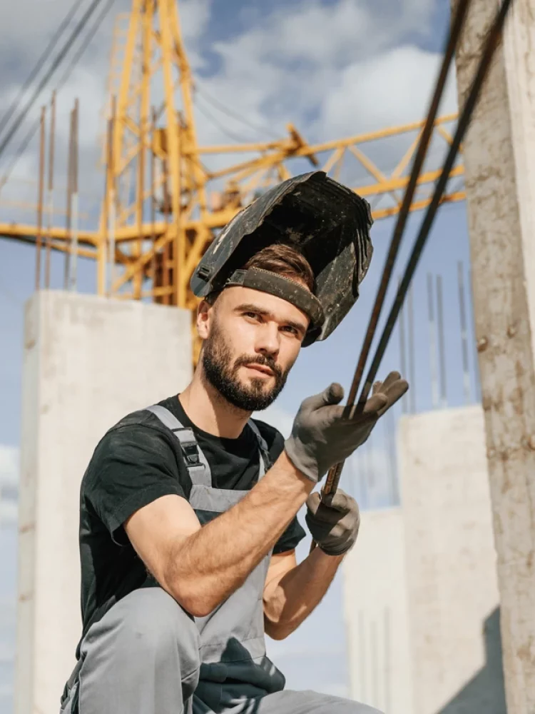 in-welding-mask-man-in-uniform
